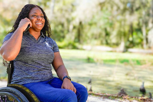 Wounded Warrior Corine Hamilton Holds A Phone