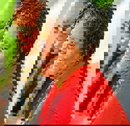 Wounded warrior Sam Hargrove laughing with a group of fellow warriors.