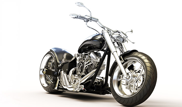 A black motorcycle against a plain white background.