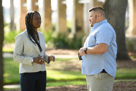 Army veterans Danielle Green and Jake Norotsky engage in conversation.