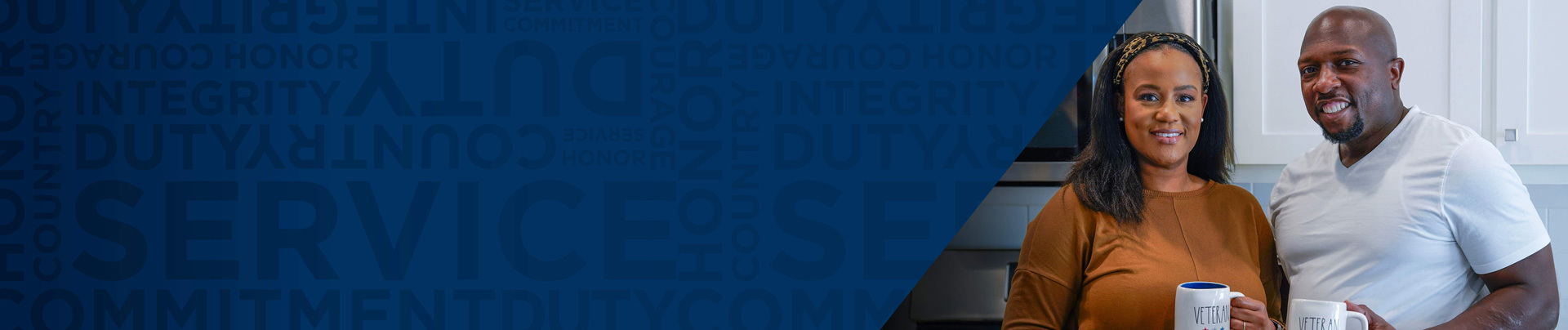 Warrior Melvin Gatewood and his wife smiling while holding coffee mugs in their kitchen.